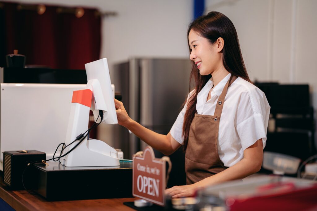 A cafe manager running day-to-day operations smoother with a cloud POS system for restaurants.