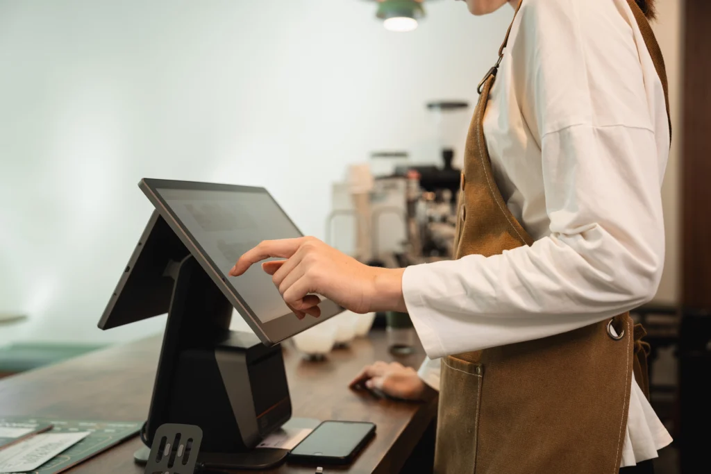 woman utilising an AI POS System